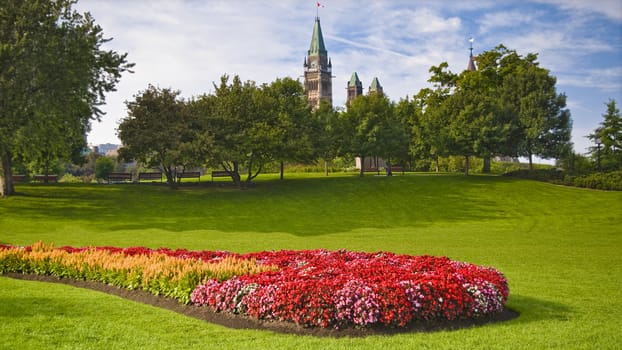 The canadian Parliament Peace Tower seen from Major's Hill park in Ottawa, Canada.