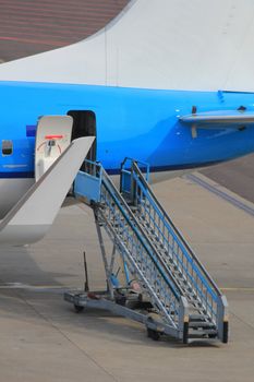 airplane on the gate, rear exit detail