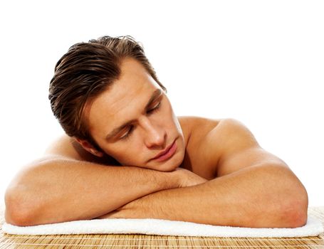 Close-up of an attractive man resting in a spa center