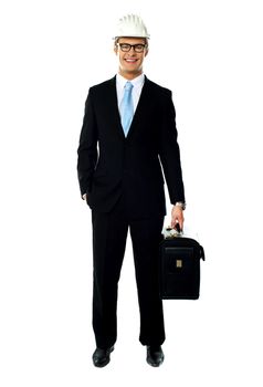 Portrait of smiling young architect carrying briefcase isolated over white