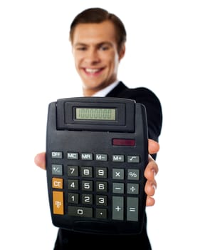 Smiling modern businessman showing calculator isolated over white