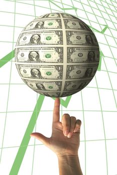 Financial concept - hand holding spinning money globe with chart background