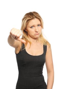 Young attractive girl shows gesture thumb down. Isolated on white.