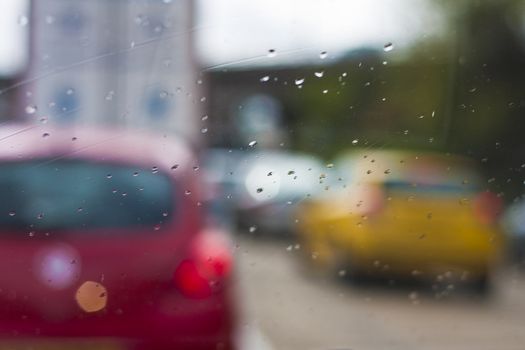 Traffic jam on a wet day ( focus on wind screen)