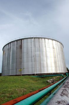 crude oil storage tanks in the area of oil mining