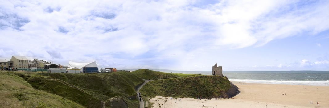 ballybunion in summer with panaramic view of the town, castle and beach