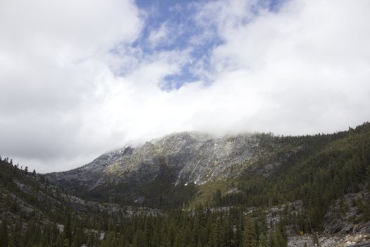 mountain side with a storm brewing