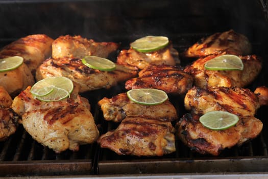 Summer time barbeque of chicken and citrus