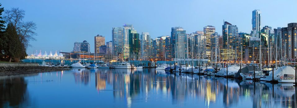 Vancouver BC City Skyline along False Creek by Stanley Park at Blue Hour