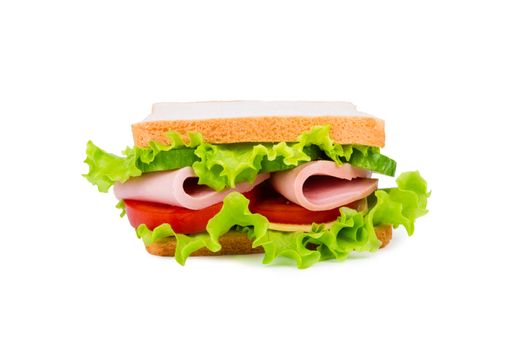 Sandwich with ham,cheese and fresh vegetables isolated on white background