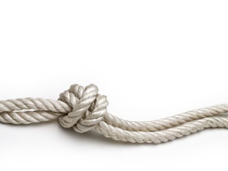 Rope with a knot on white background