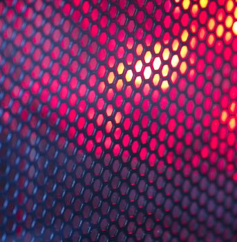 a red and black abstract mesh