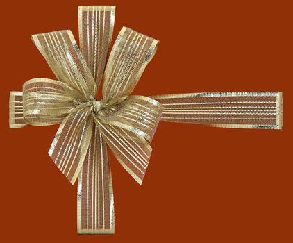gold gift ribbon isolated on red background