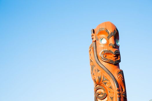 Isolated cultural art, Maori carved totem pole.