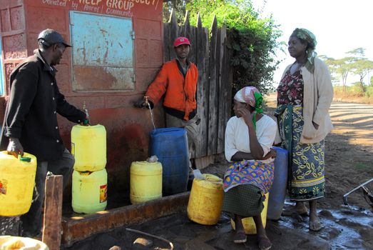 Mtito Andes, Kenya 13 JULY 2009 people are without water supplies in a fountain,thanks to various humanitarian organizations, the people of the village of Andes Mtito can fetch water from a source.Mtito Andes is a village close to Kilimanjaro and the lack of water is very serious