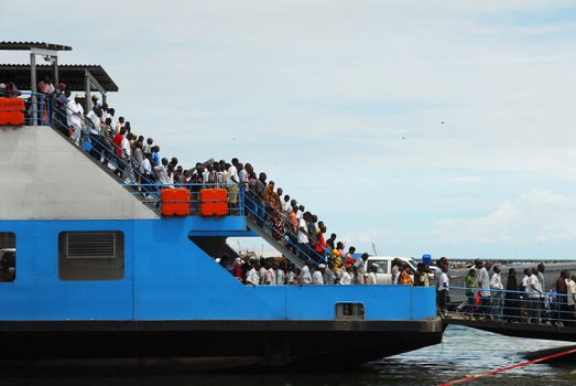 Dar es Salaam, Tanzania in February 25.2010: passengers in the ferry that leaves from the capital Dar Es Salaam to Bagamoyo.