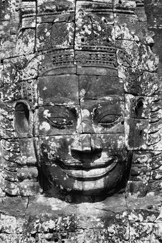 Panoramic picture of a face in Bayon temple in Angkor Wat Cambodia
