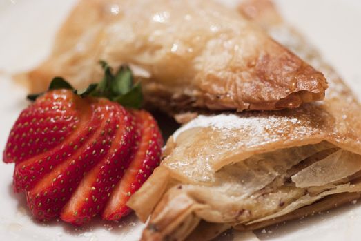 Filled Apple Pastries with Strawberries and Sugar