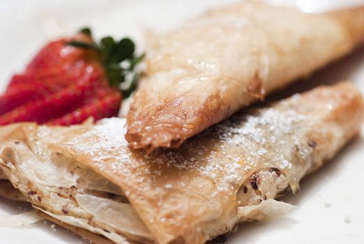 Filled Apple Pastries with Strawberries and Sugar