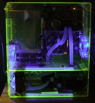 Transparent computer with liquid cooling and UV light