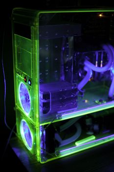 Transparent computer with liquid cooling and UV light