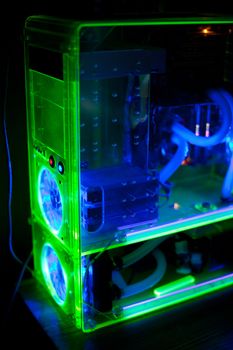 Transparent computer with liquid cooling and UV light