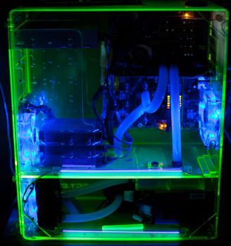 Transparent computer with liquid cooling and UV light