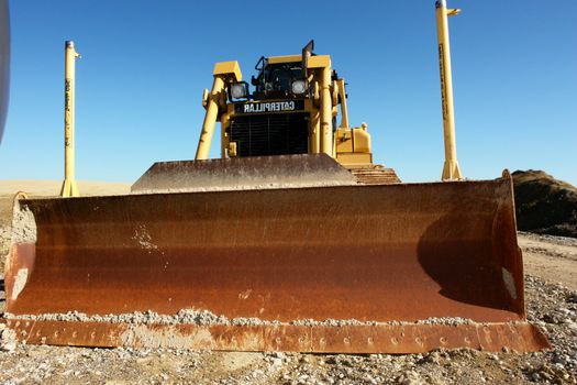 excavator on a building site on a sunny day