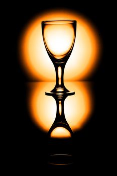 water glass on reflecting ground shimmering blue