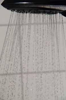 water drops falling from a shower indoors