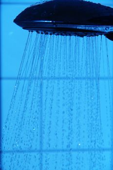 water drops falling from a shower indoors