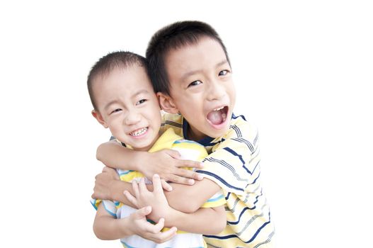 Very happy brothers embraced each other in the white background