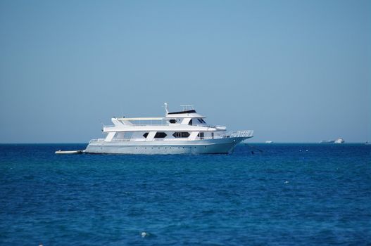 a white yacht in the red sea