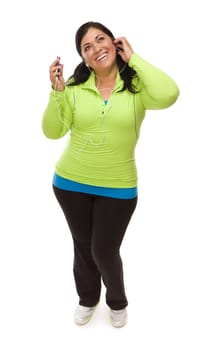 Attractive Middle Aged Hispanic Woman In Workout Clothes with Music Player and Headphones Against a White Background.