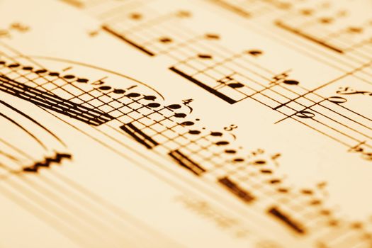 close-up of an old music sheet, very shallow DOF! BW-sepia toned!