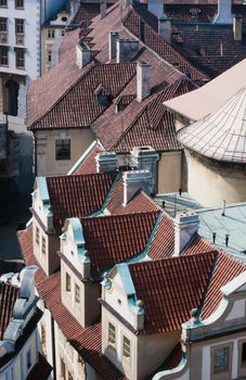 Overhead view looking down onto the tiled red rooftops of Prague, capital of Czechia, Europe