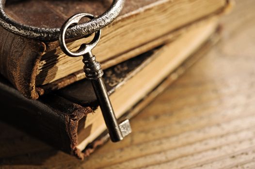 old keys on a old book, antique wood background