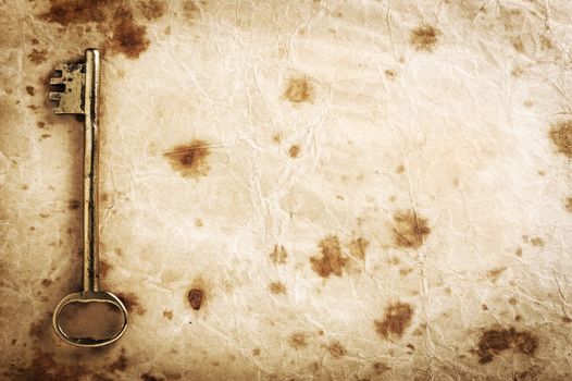grunge paper background texture with old key