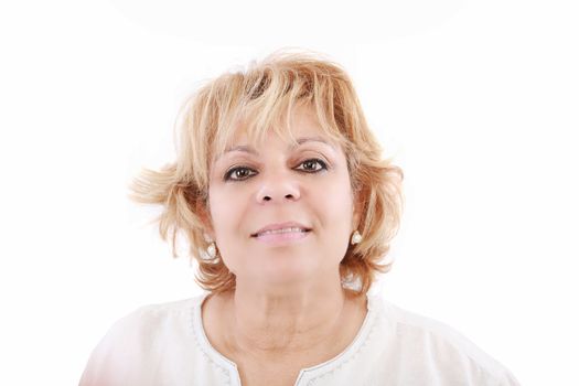 Portrait of pretty mature woman against white background