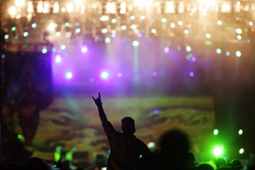 people celebrating on an open air shillouettes