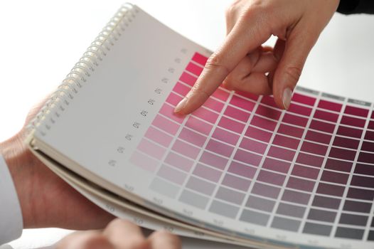 woman Choosing color from color scale