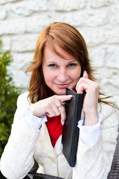 Portrait of pretty girl in street cafe