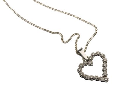 old heart pendant of silver, diamond  on white