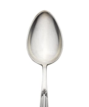 Old silver spoon with ornament isolated on white background