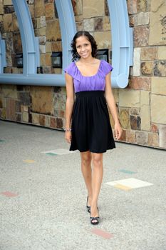 African american fashion model posing outside.