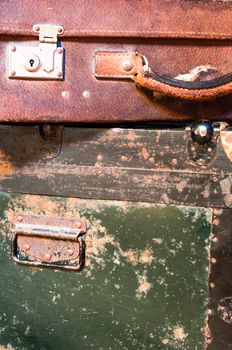 Old worn suitcases close up