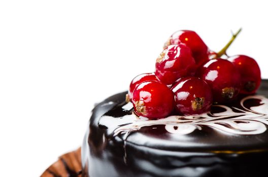 Close up cake with red currant isolated