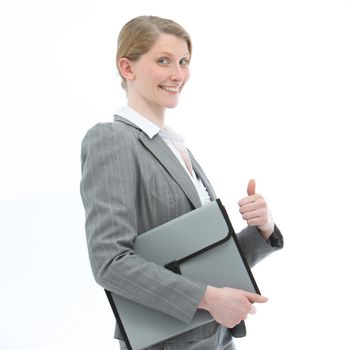 Motivated smiling professional woman in a fashionable jacket carrying a folio file giving a thumbs up