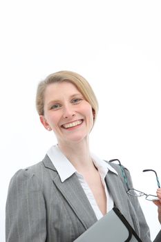 Smiling mature businesswoman or professional holding a modern fashionable pair of spectacles and a folio