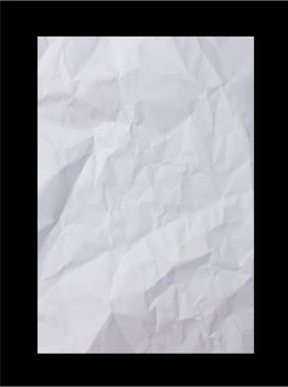 Crumpled paper on black background